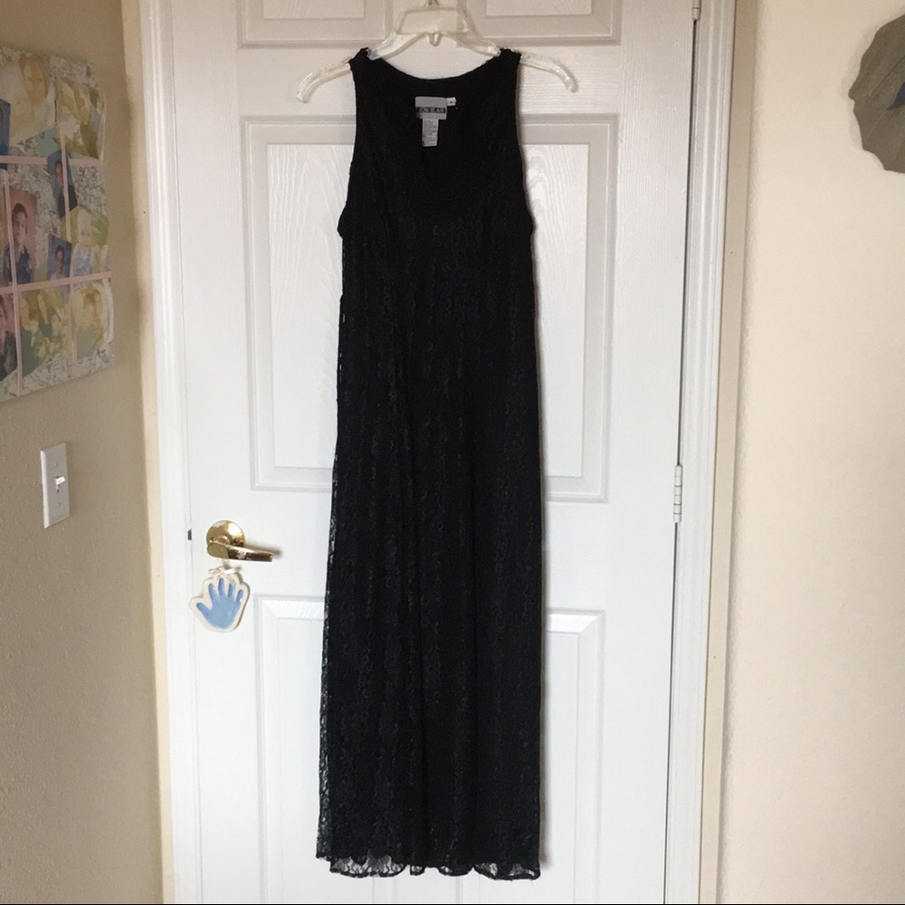 Beautiful sleeveless, black lace dress.
